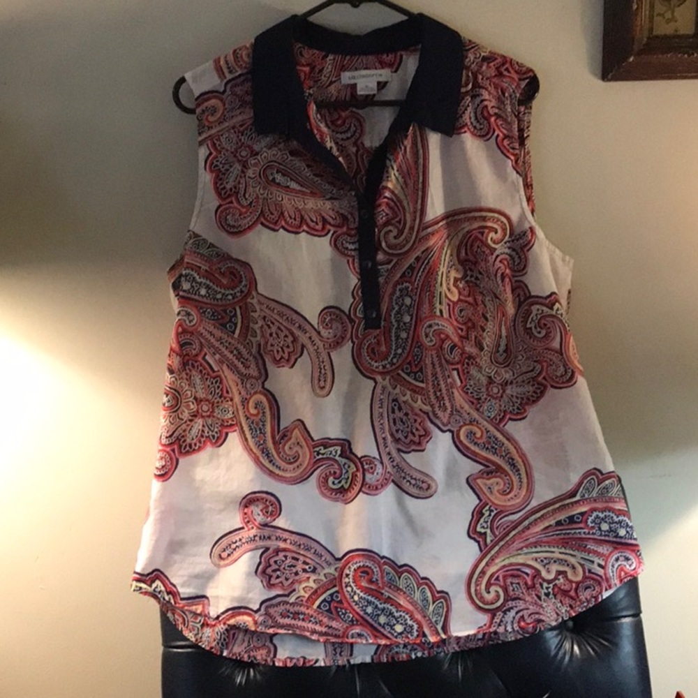Paisley rules in this cute top with navy blue trim